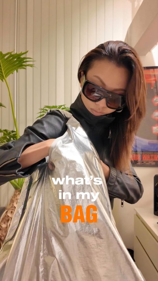 Instagram post by @bibiyua for LeSportsac. Caption reads: What’s in my bag @lesportsacjapan **+ [...].
