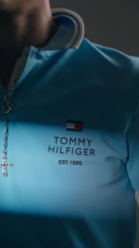 Instagram post by @akshaynandrajogg for Tommy Hilfiger. Caption reads: football, through a Hilfiger lens 🩵 #HILFIGERGAME....