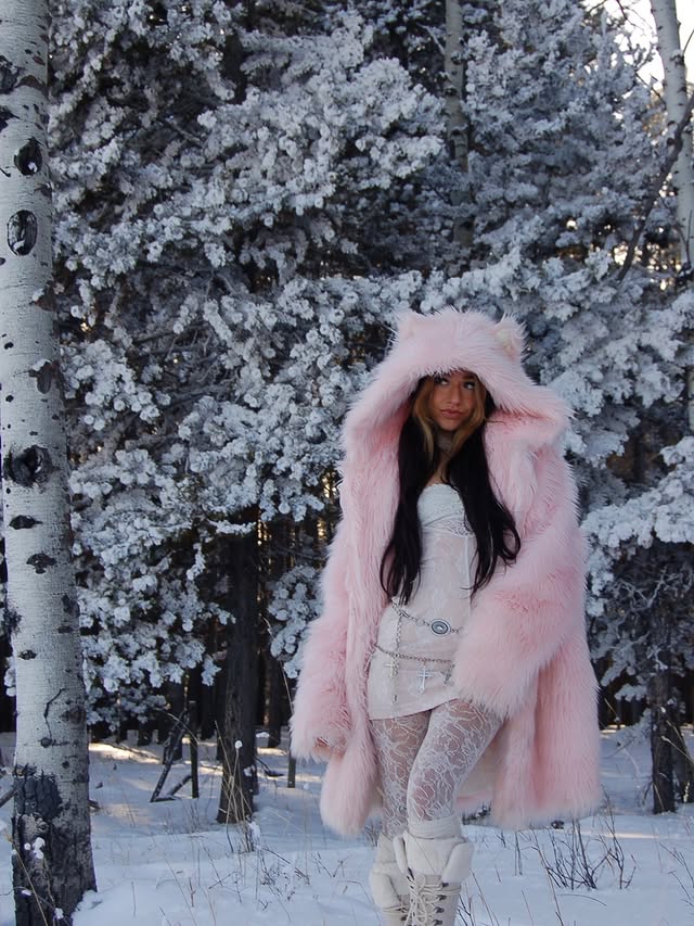 Instagram post by @peachybass for SpiritHoods. Caption reads: Ice cold outside, soft girl inside 🎀....