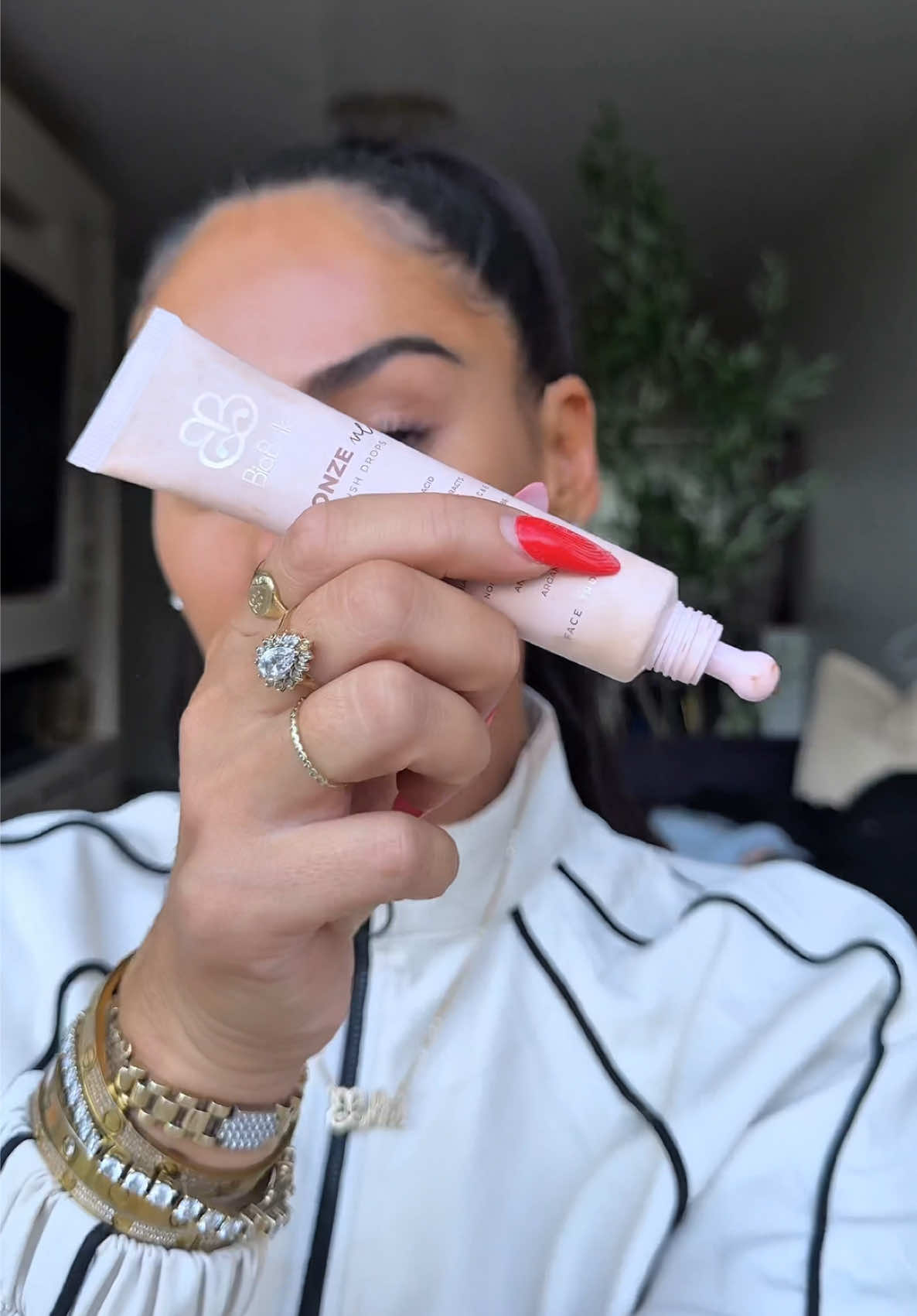 TikTok post by @blamurphy for BiaBelle Beauty. Caption reads: @BiaBelle Bronze Me Airbrush Drops >>> I use them....