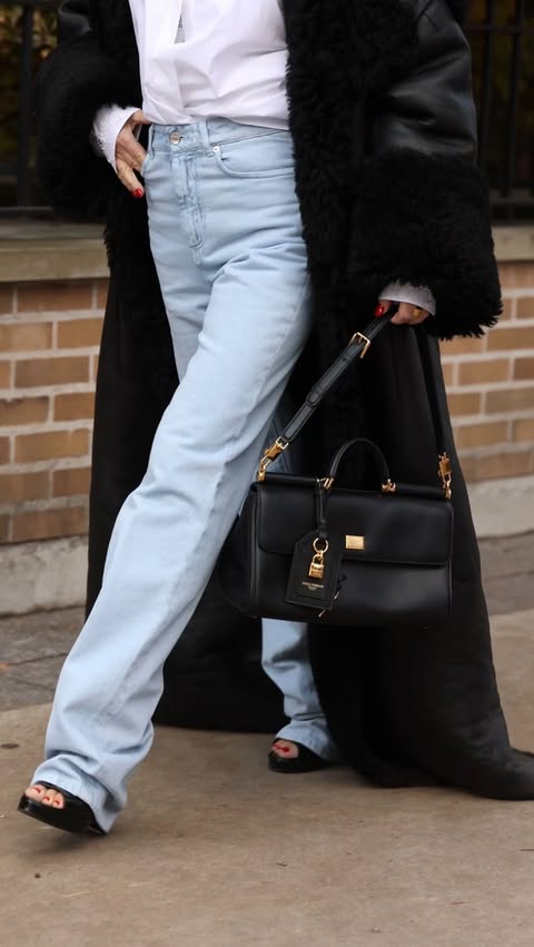 Instagram post by @lisacorbo for Dolce&Gabbana. Caption reads: i’ll never apologize for a long coat.