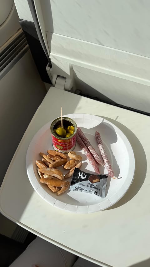 Instagram post by @megansheley for Hu Kitchen. Caption reads: [...] I’ll always take the train. #hupartner....