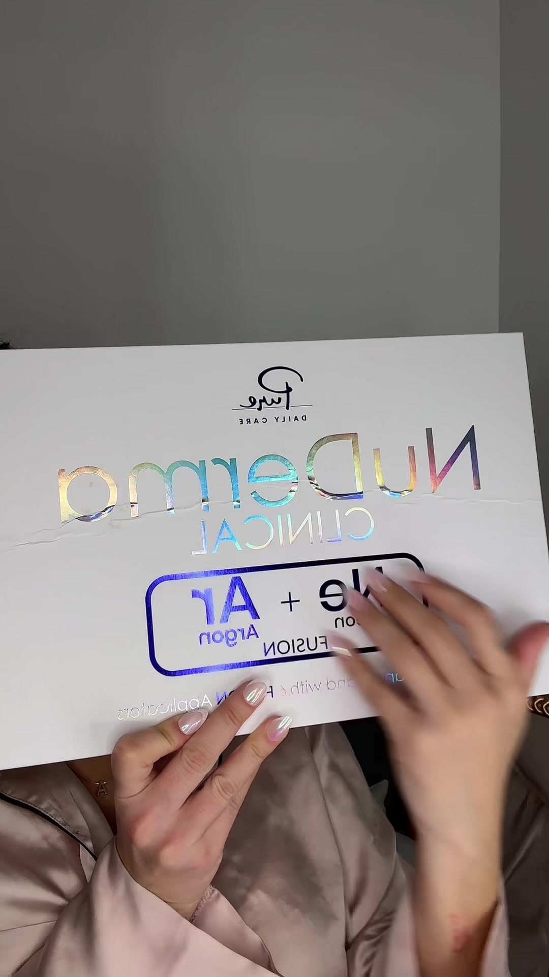 TikTok post by @tcanna_ for Pure Daily Care NuDerma Wand. Caption reads: [...] #skincareroutine #fyp @Pure Daily Care....