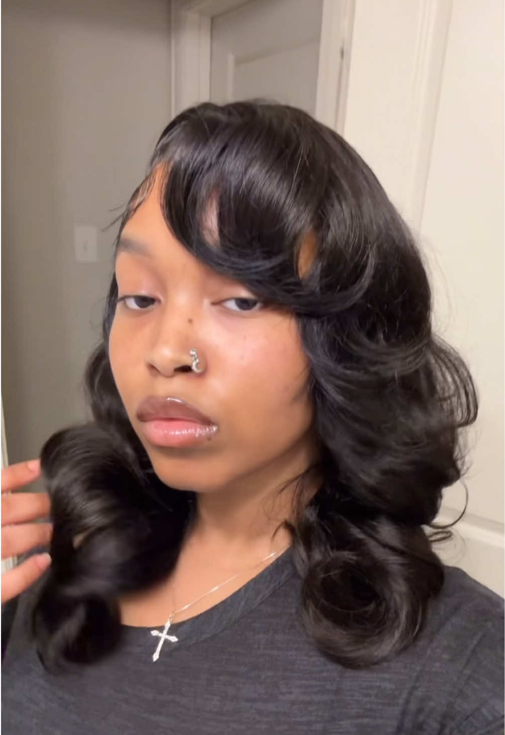 TikTok post by @maniwitdahoodie for Mscoco Hair. Caption reads: These curls are so pretty! Wig from @Mscoco Hair....