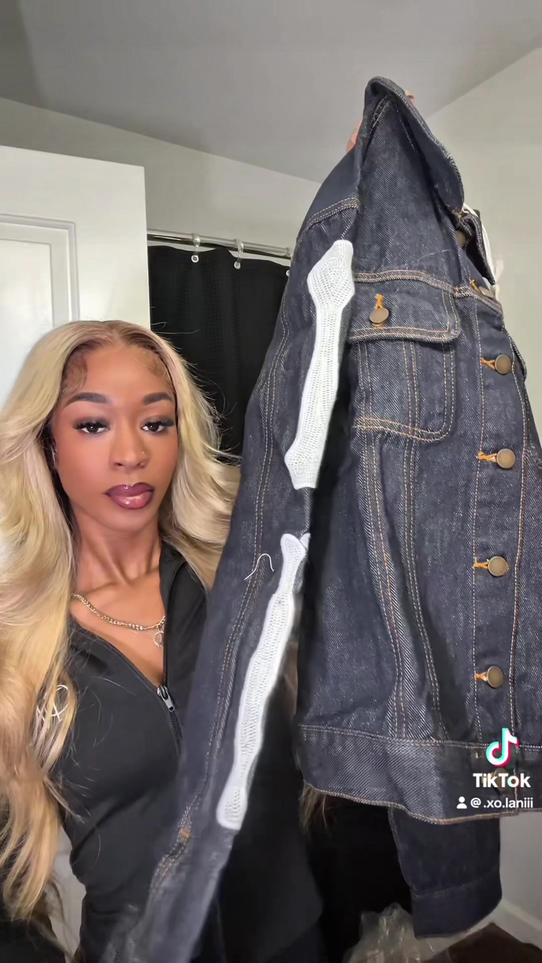 TikTok post by @.xo.laniii for mnml. Caption reads: mnml Raw Skeleton Trucker Jacket😮‍💨 @mnml [...].