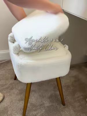 TikTok post by @teddyandhudson for Living and Home. Caption reads: The affordable dressing table chair that secretly....