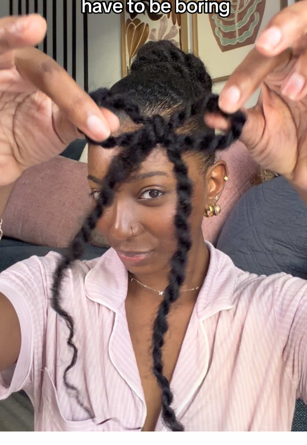 TikTok post by @practicallypoised for Style Icon Hair. Caption reads: [...] natural styles interesting 😊🤏🏾 @Style....