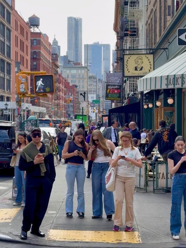 Instagram post by @nyc for Sunglass Hut. Caption reads: [...] buzzing with people. Quick stop at Sunglass....