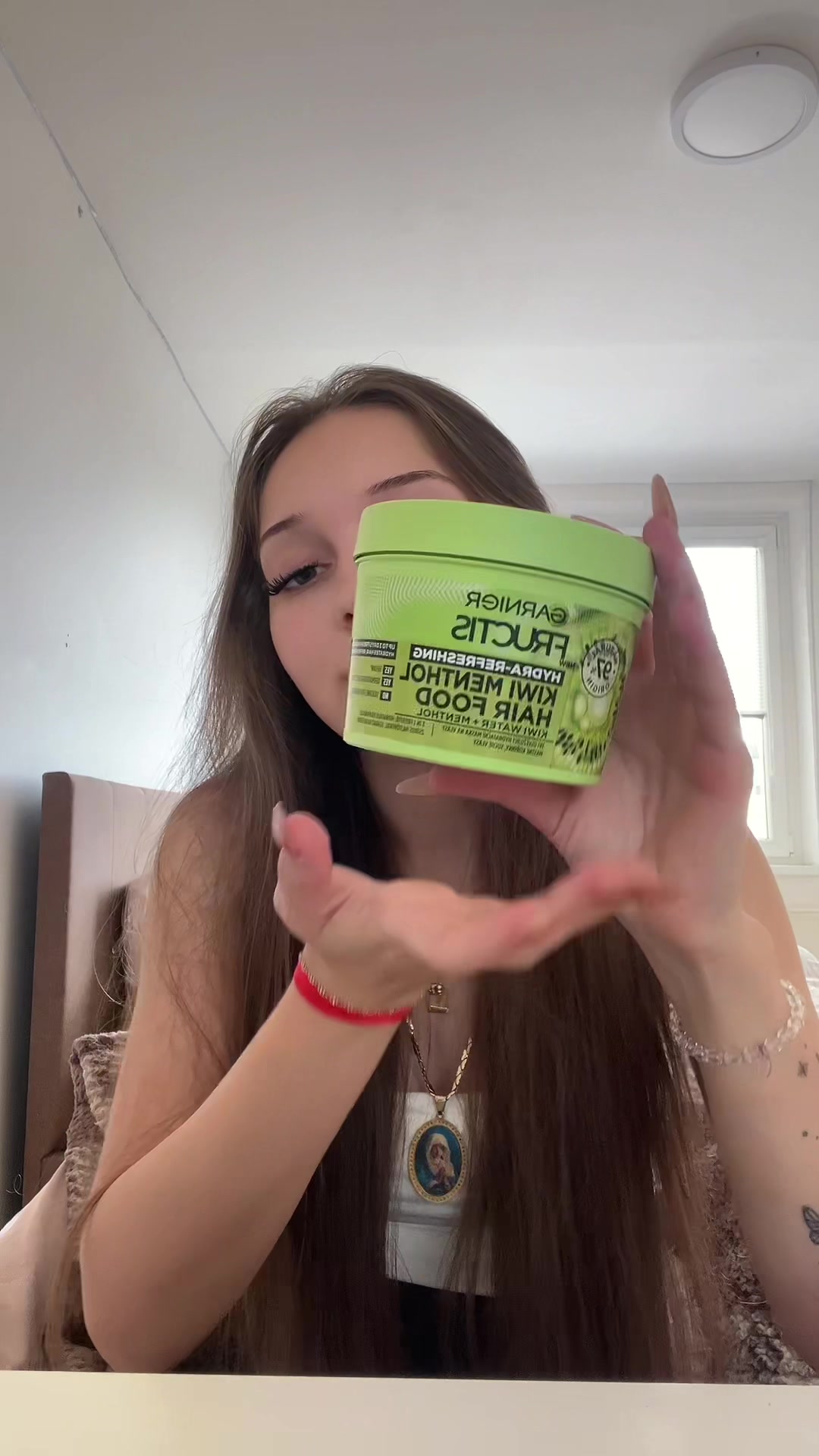 TikTok post by @virakovaaaa for Garnier CZ/SK. Caption reads: #ad #LorealistarCHS #garnierfructis....