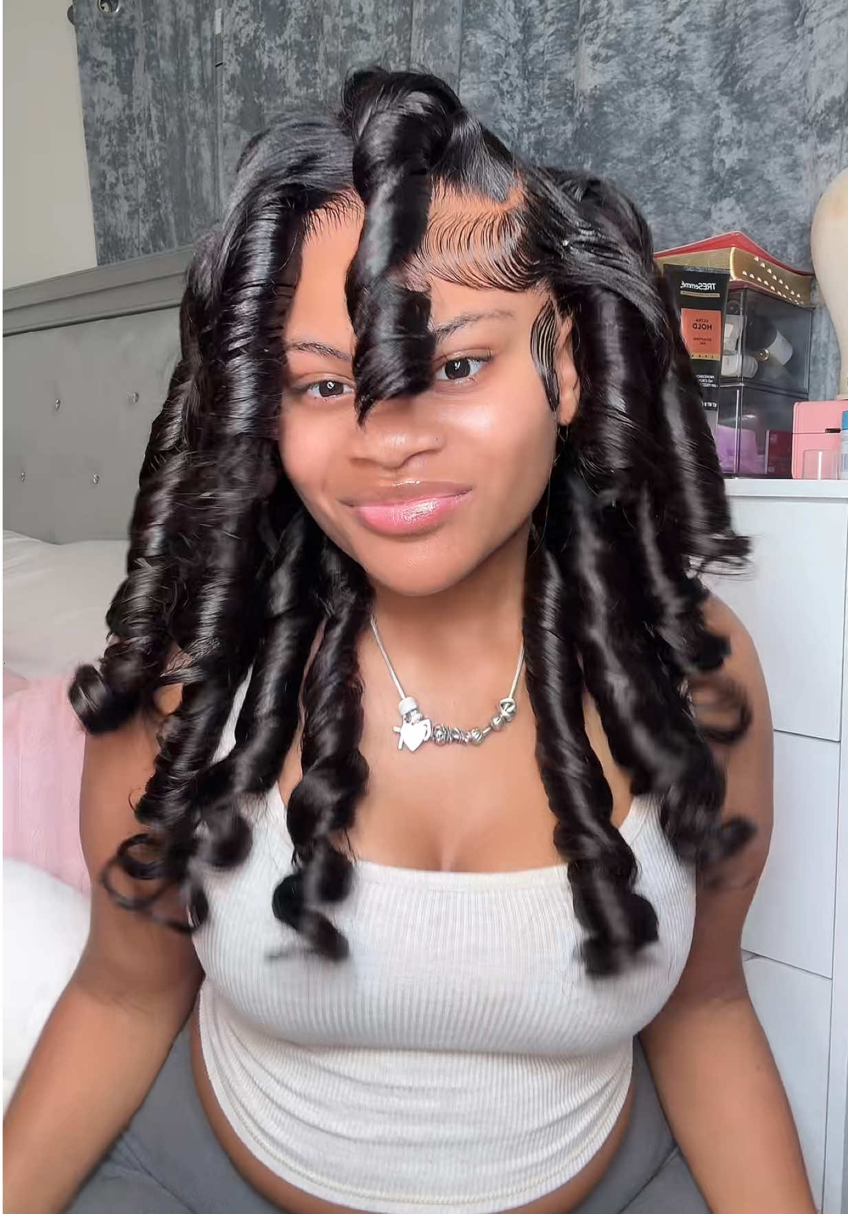 TikTok post by @misslonik for Cynosure Hair. Caption reads: [...] on these curls 🤏🏽😍 Wig from @Cynosure....