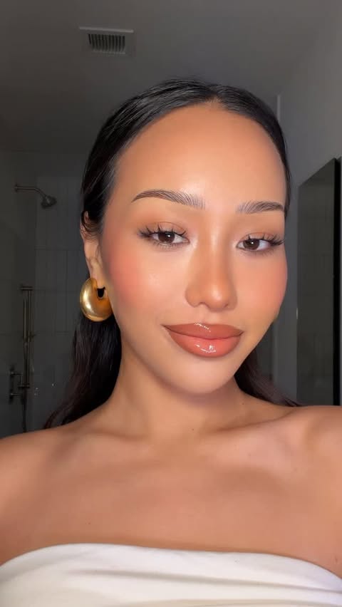 Instagram post by @taontm for Hourglass Cosmetics. Caption reads: Makeup that melts into ur skin....