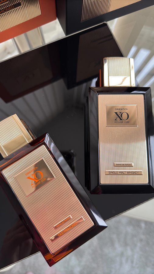 Instagram post by @p.trish_g32 for Orientica Perfumes. Caption reads: 🧡 @orienticaperfumes XO Xclusif Oud Collection....