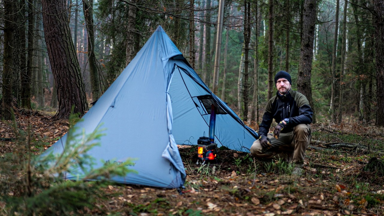 YouTube post by @Bushcraftowy for E-Militaria. Caption reads: I spent the longest night of the year in the....