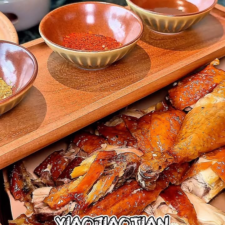 Instagram post by @wantwoeatsg for VisitSingapore. Caption reads: Would you visit Xiao Jiao Tian for that crispy....