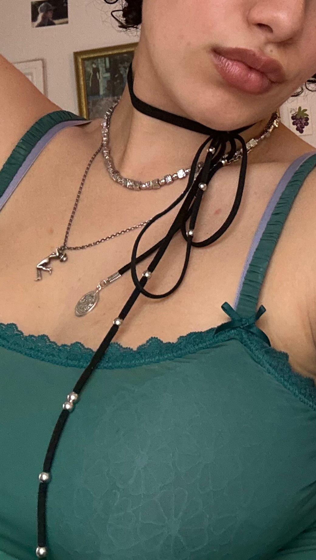 Instagram post by @introvertedbby for Universal Musiek. Caption reads: on repeat 😼🎧💋🩷
#ad / @universalmusicgroup....