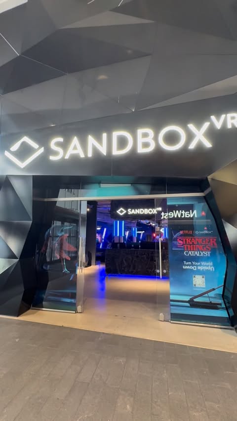 Instagram post by @jadelittlelife for Sandbox VR. Caption reads: [...] got upgraded!! We had an awesome time....