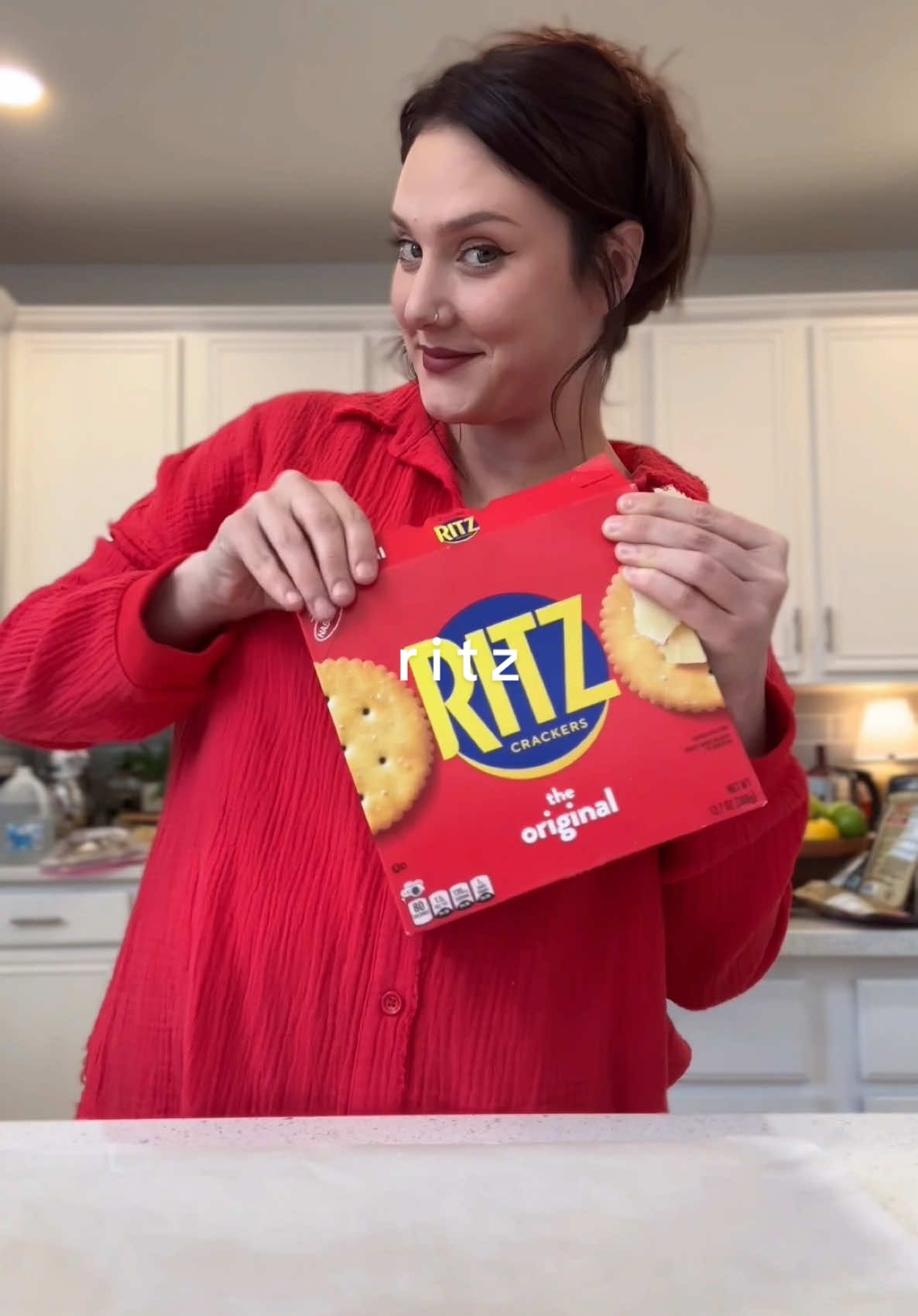 TikTok post by @positively_paige for RITZ Crackers. Caption reads: [...] in a snap for your football Sunday! @RITZ....