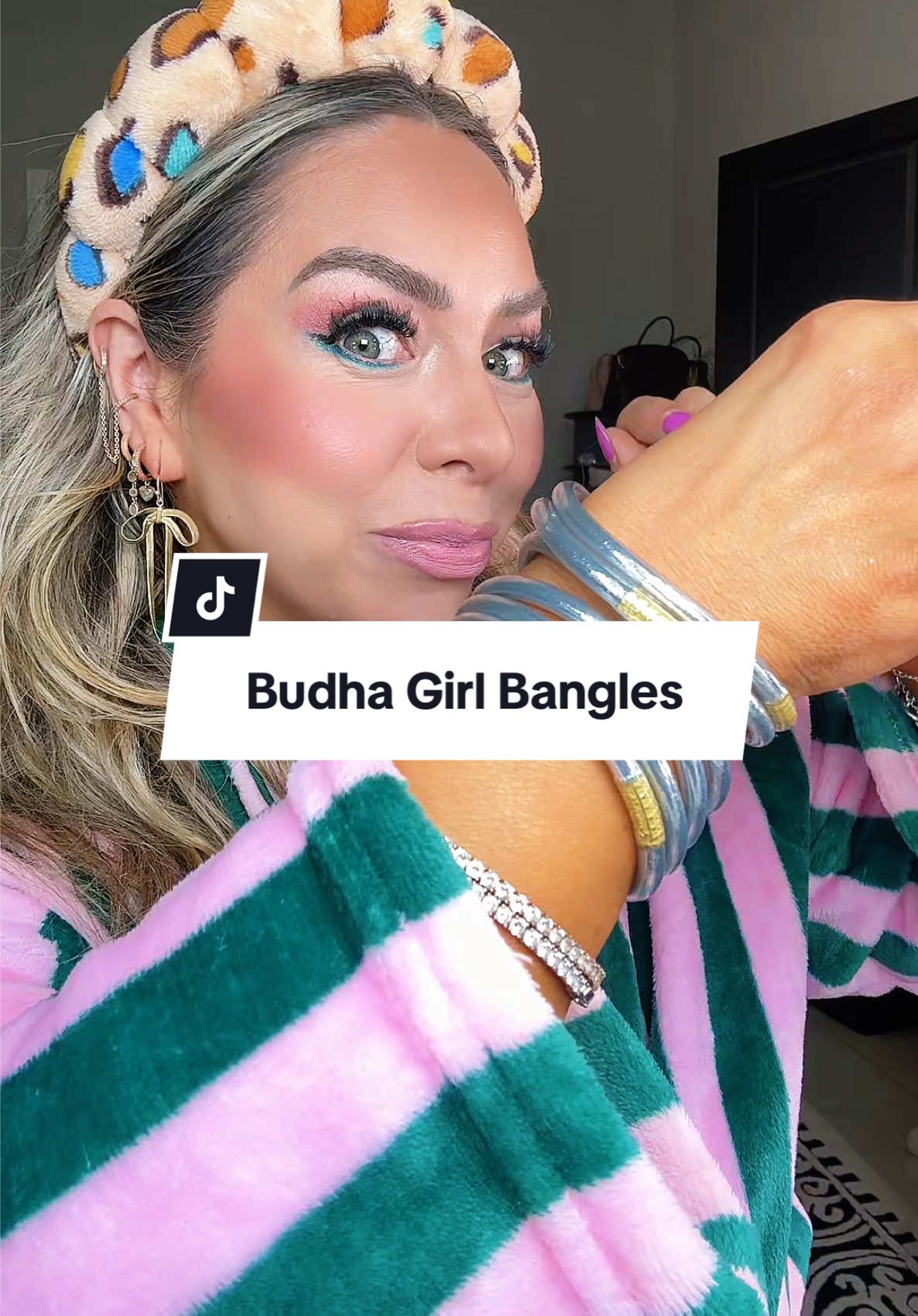 TikTok post by @lindaannettem for BuDhaGirl. Caption reads: Im addicted to @BuDhaGirl Bangles😭✨ these silver....