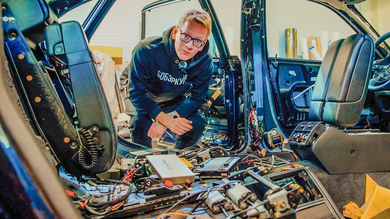 YouTube post by @AcademeG for Pro Business. Caption reads: WE REPAIR A LOT OF ELECTRONICS IN OLD AUDI A8 W12.....