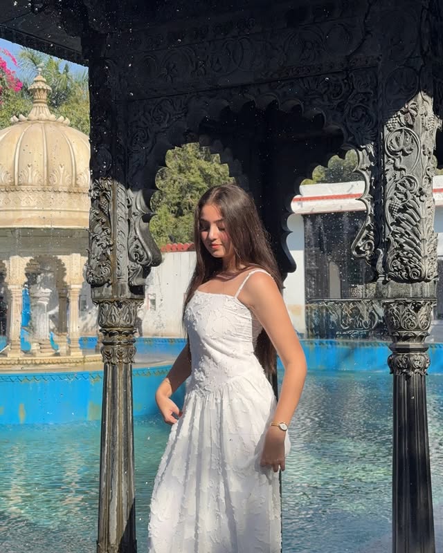 Instagram post by @ishaxjain for Daniel Wellington. Caption reads: wrapped around elegance @danielwellington....