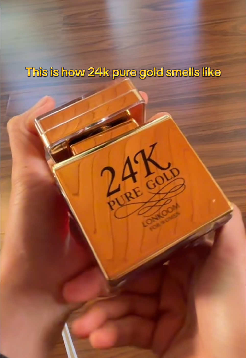 TikTok post by @windyrann_ for LONKOOM.ES. Caption reads: 24k pure gold Lonkoom perfume @LONKOOM.ES #24kgold....