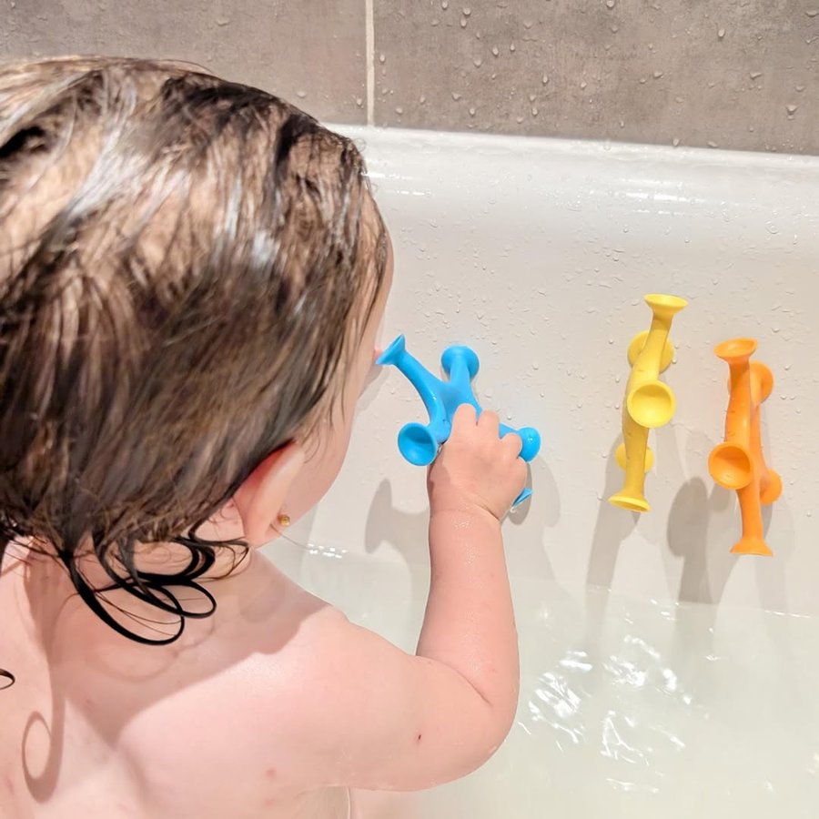 Instagram post by @vanessa93_x for Ubbi. Caption reads: Enjoying her new @ubbiworld_uk bath toys that are....