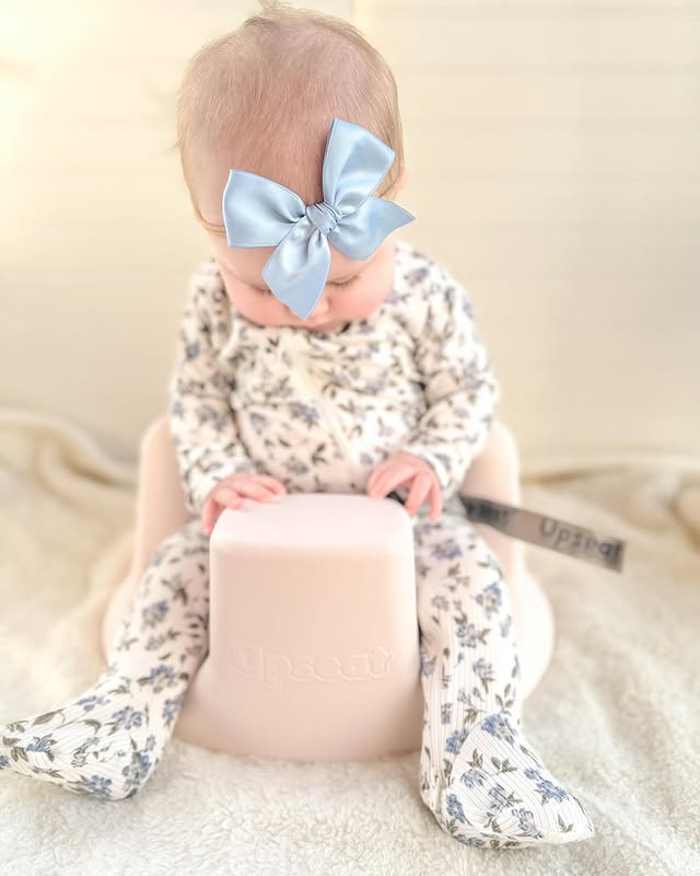 Instagram post by @rachelle.katlyn for Upseat. Caption reads: Swipe to see Remi smile in her new @theupseat 🥺🤍....