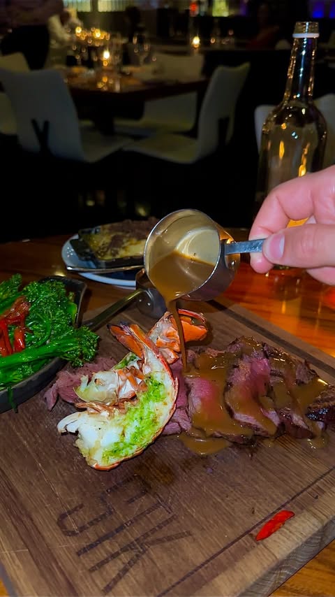 Instagram post by @the.hackney.foodie for STK Steakhouse. Caption reads: £90 Valentine’s steak lobster menu in central....