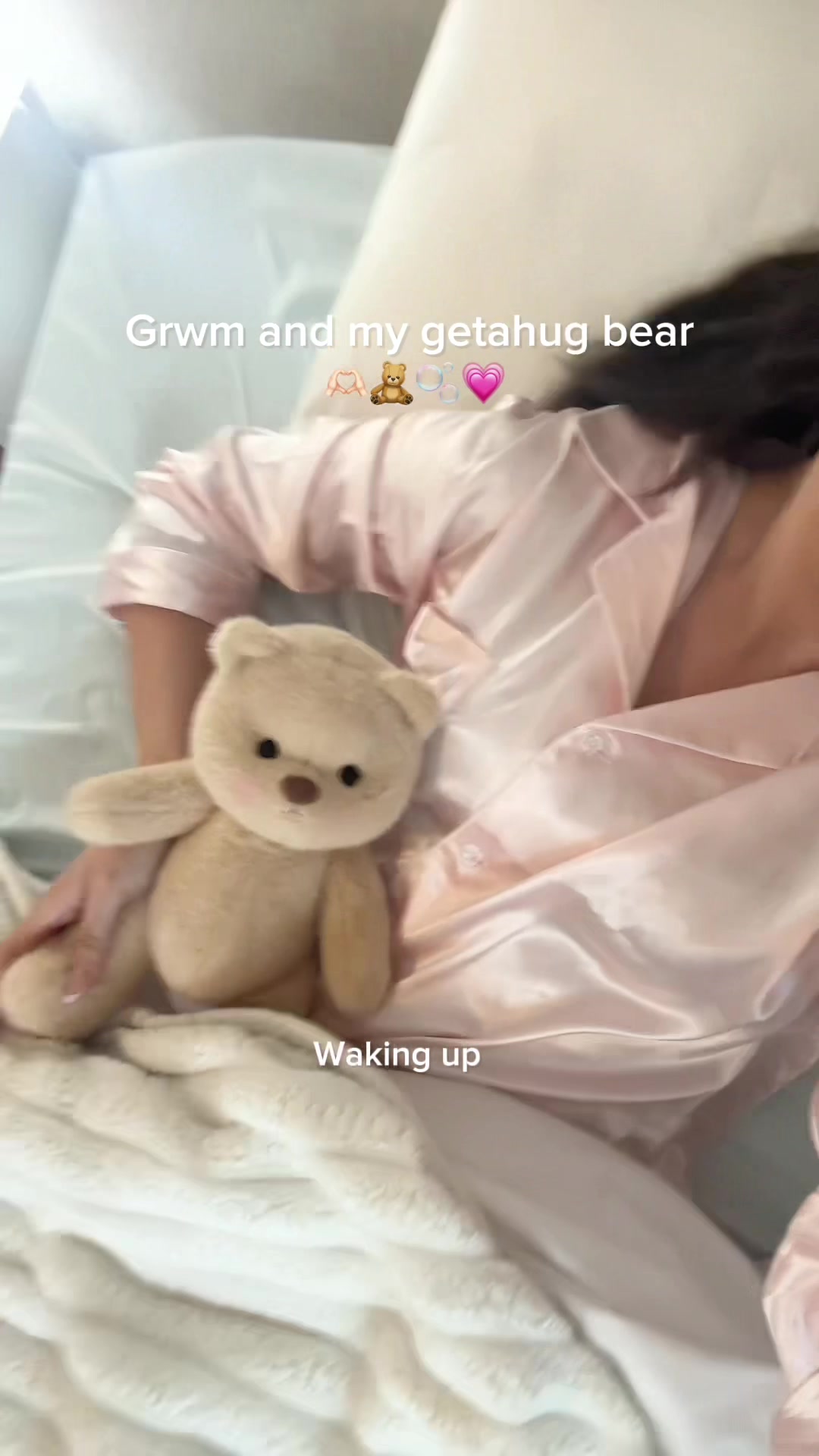 TikTok post by @katie_belle11 for Getahug. Caption reads: Grwm and my @Getahug.co bear 💗 || Use code....