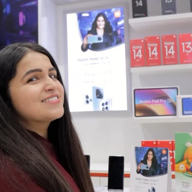Instagram post by @upasanakochhar for Xiaomi India. Caption reads: #AD Capture brilliance, experience power — Redmi....
