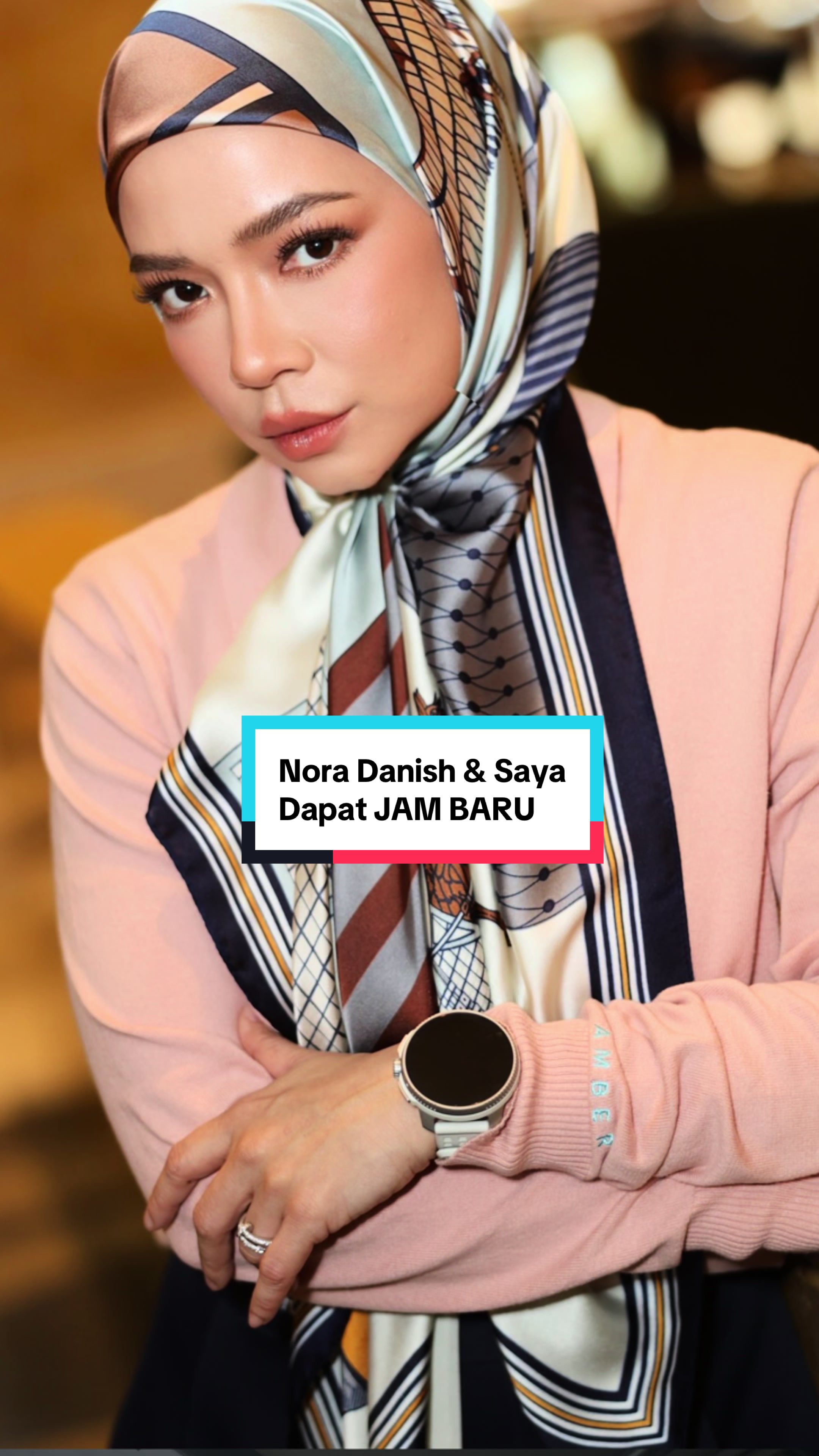 TikTok post by @hanifloid for Suunto. Caption reads: Nora Danish & saya dapat jam baru @Suunto Malaysia....