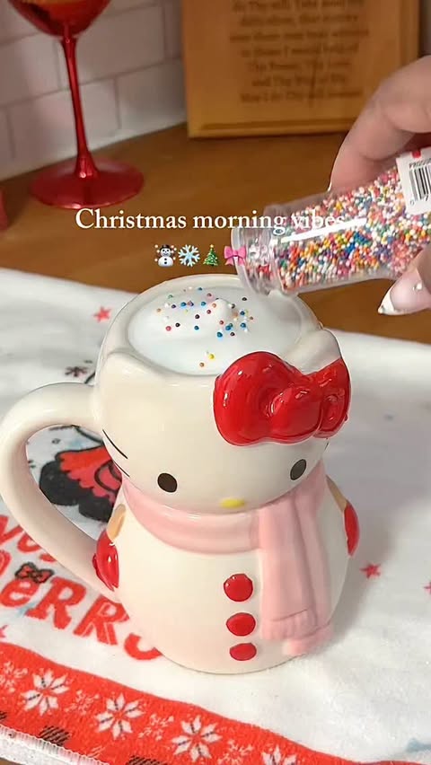 Instagram post by @takiyahdenise for Toynk. Caption reads: [...] this @hellokitty snowman mug is from....