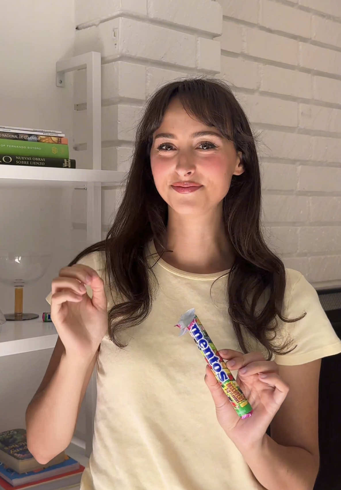 TikTok post by @happy.rugs for Mentos. Caption reads: Mentos just dropped their new Discovery Roll with....