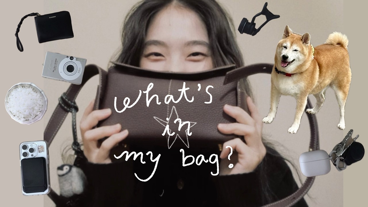 YouTube post by @kotonograce for JIL SANDER. Caption reads: what’s in my bag 🐧 everyday essentials, gadgets,....
