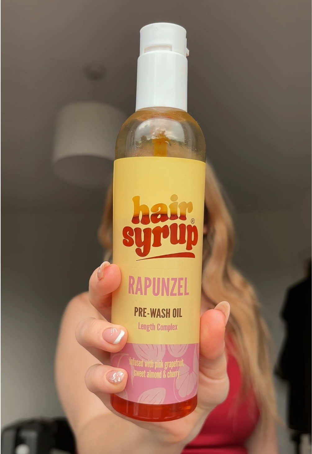 TikTok post by @ruby.lomas for Hair Syrup. Caption reads: hairs getting longer & longer💁🏼‍♀️ @hairsyrup....