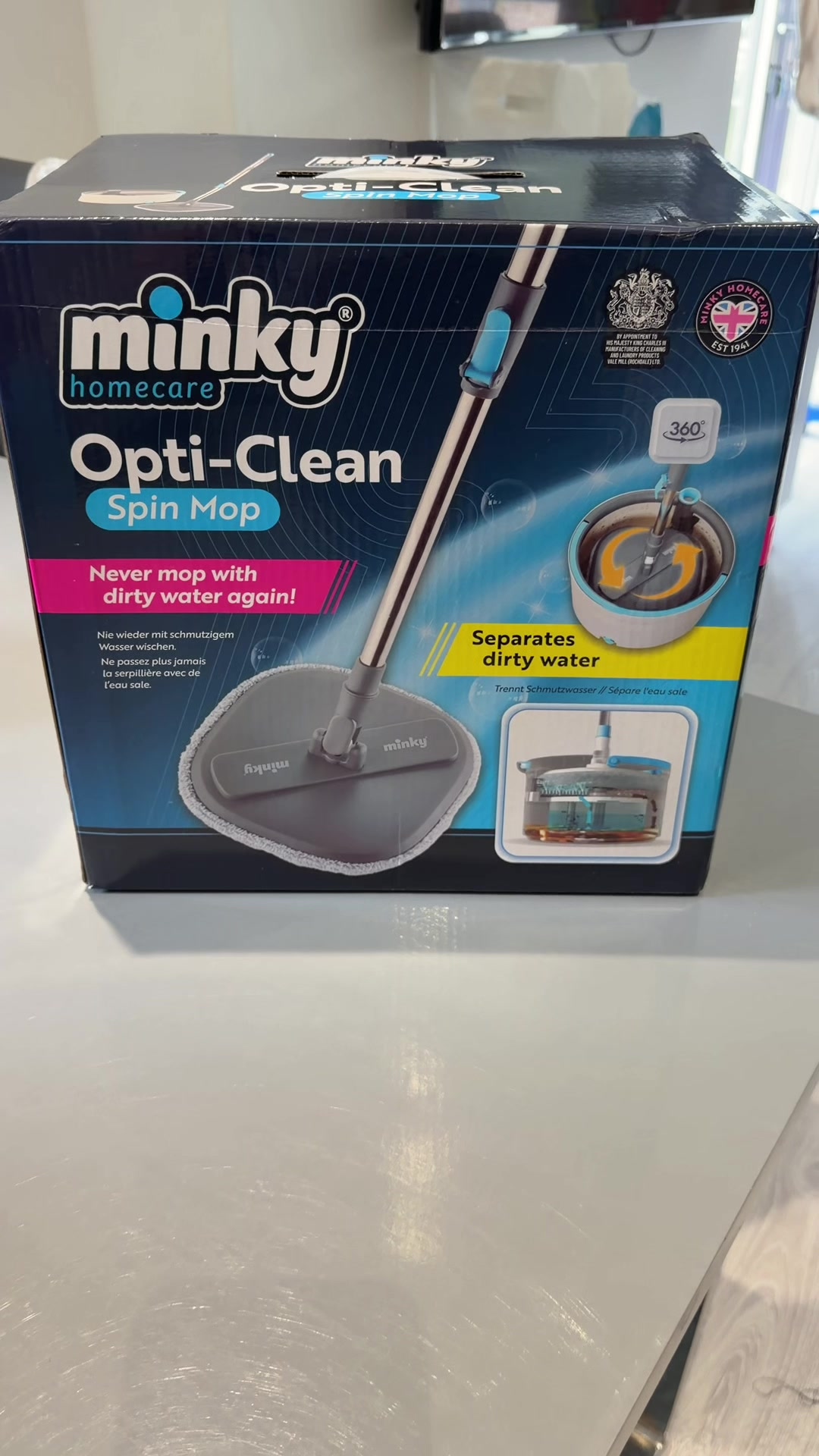 TikTok post by @rebeccaxbrown112 for Minky Homecare. Caption reads: @Minky Homecare Opti-Clean Spin Mop🧹🧽 My floors....