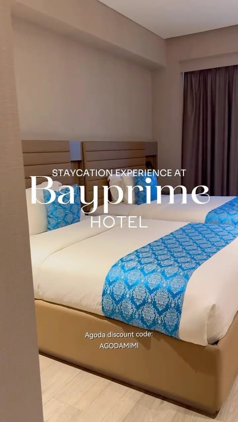 Instagram post by @heyitsmims for agoda. Caption reads: [...] view 😅 👶 Kids 0–5 y/o stay FREE Use my....