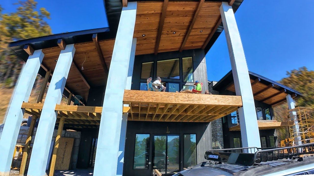 YouTube post by @PerkinsBuilderBrothers for TRUEWERK. Caption reads: Construction of a MEGA sized Modern Home P117.