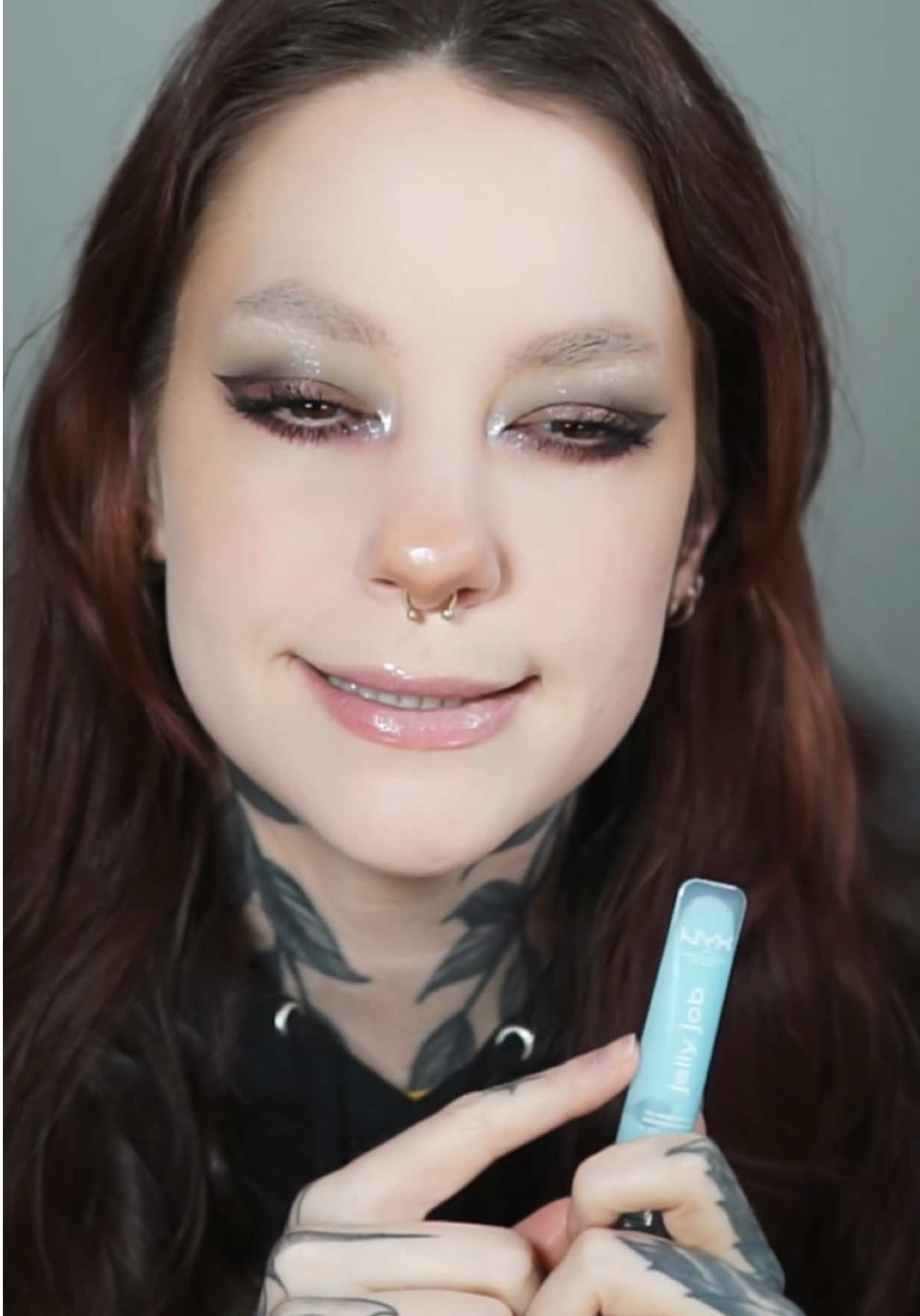 TikTok post by @courtneyquarantine for NYX Cosmetics. Caption reads: yeah of course i’m gonna talk about this 🩵 @NYX....