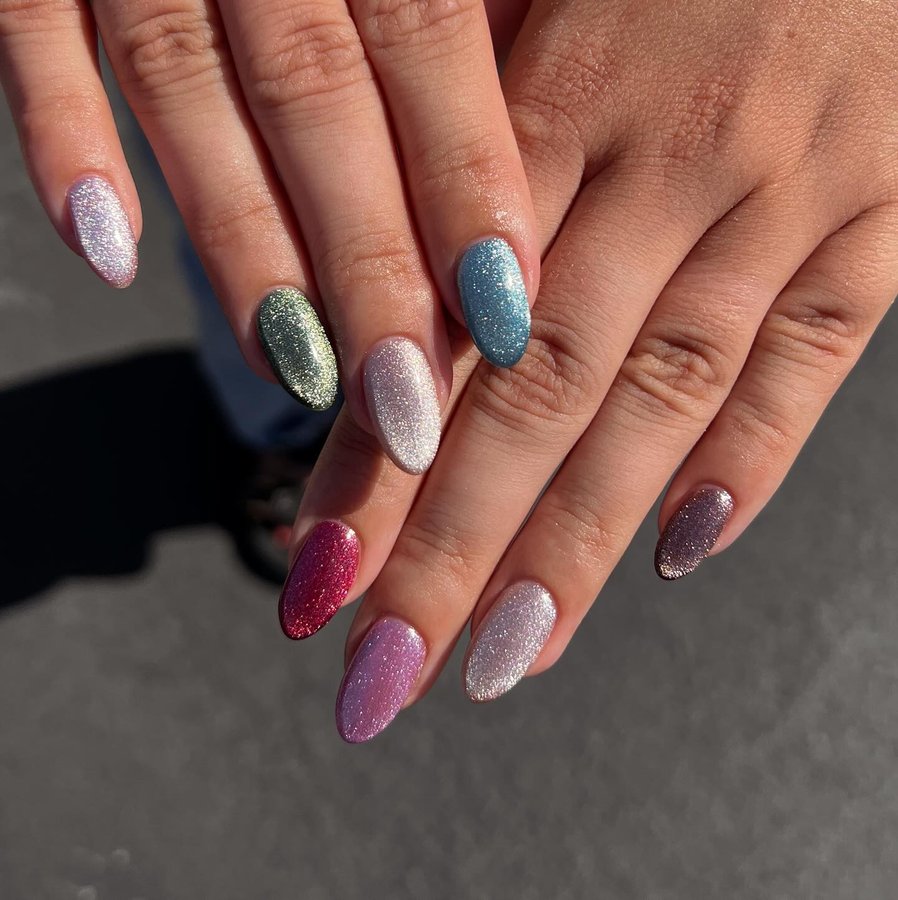 Instagram post by @mynailgirlness for ICEGEL. Caption reads: these jewel toned cat eyes 🤩✨🫶🏼

@icegel_global....