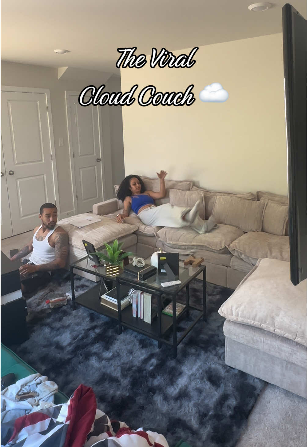 TikTok post by @jaterao92 for OVIOS OFFICIAL. Caption reads: The cloud couch that everyone has been running to....