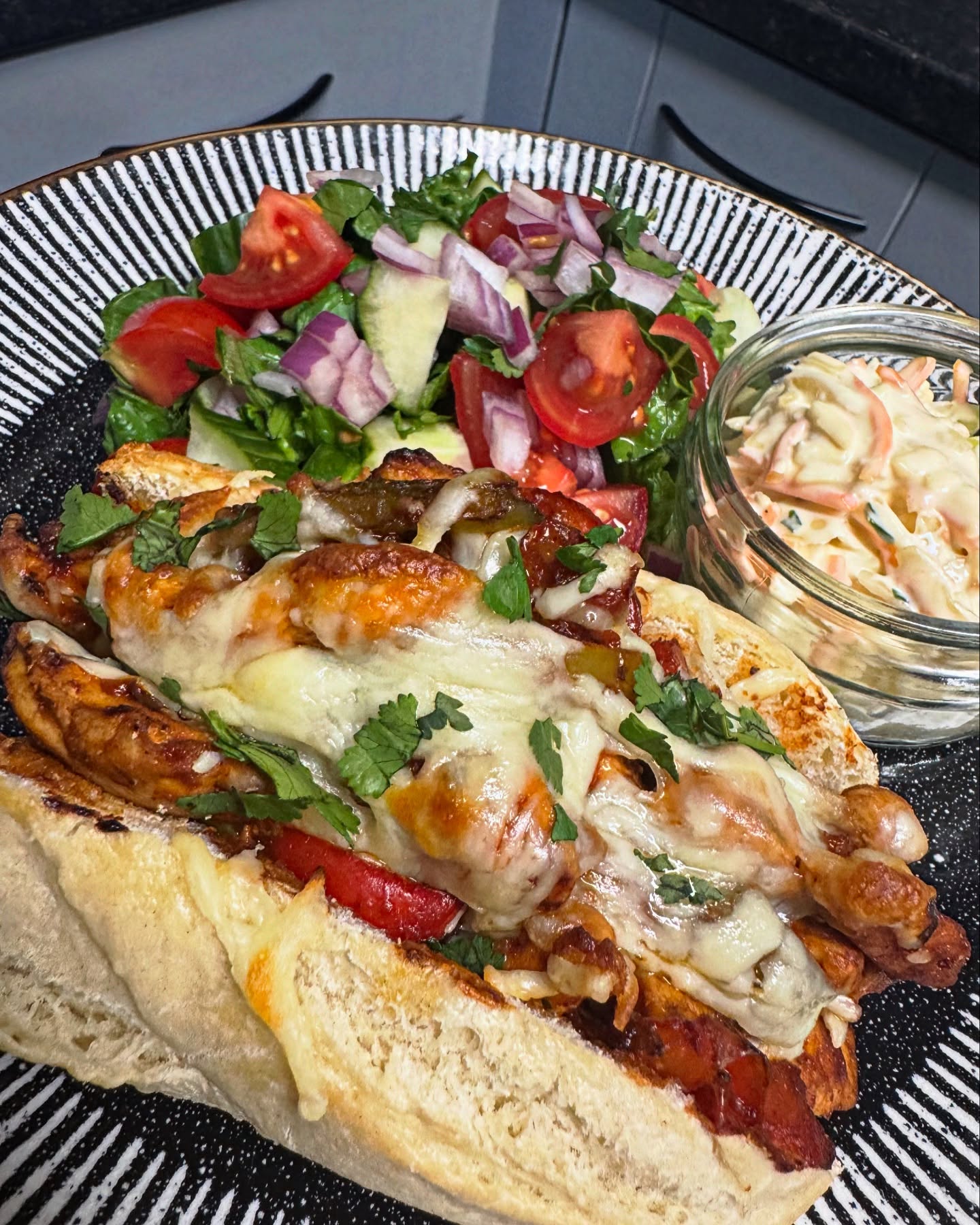 Instagram post by @sarah_cc_recipes for Jd Seasonings. Caption reads: Cheesy BBQ chicken baguette with salad & coleslaw....