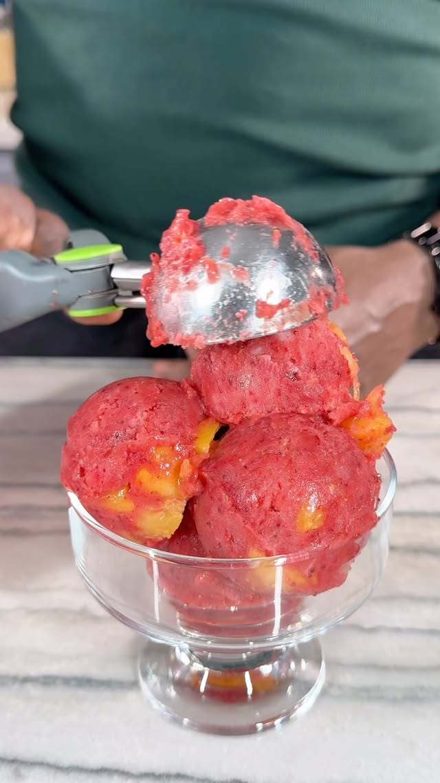Instagram post by @healthyveganeating for Kuvings. Caption reads: [...] Strawberry-Peach Sorbet #ad I’m used my....