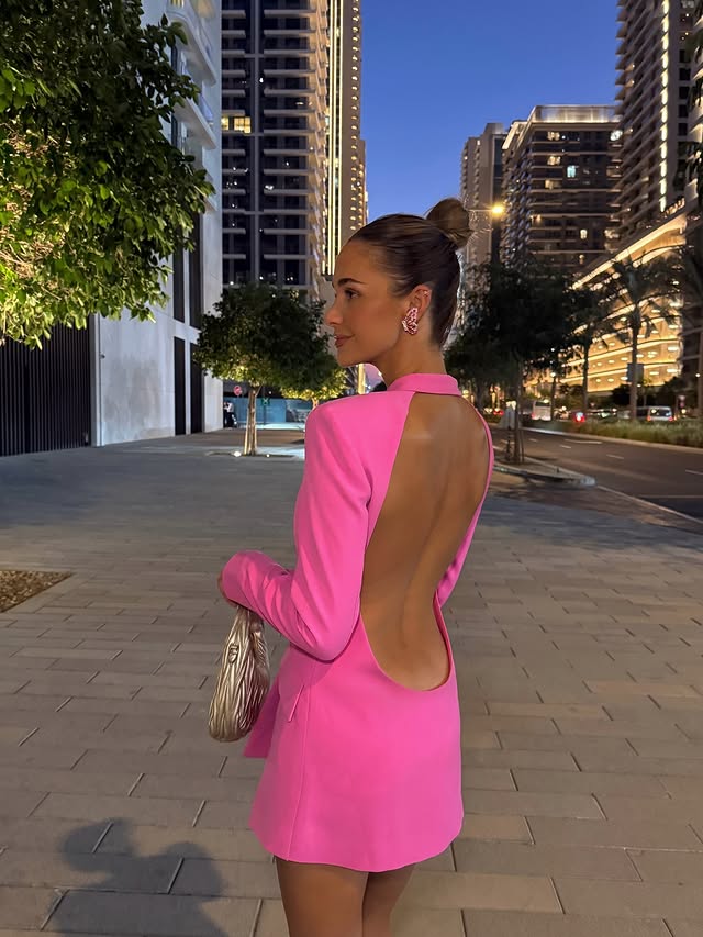 Instagram post by @emilyshak for Sophia Webster. Caption reads: 🩷🏙️

(My 🦋  jewellery is from @sophiawebster)....