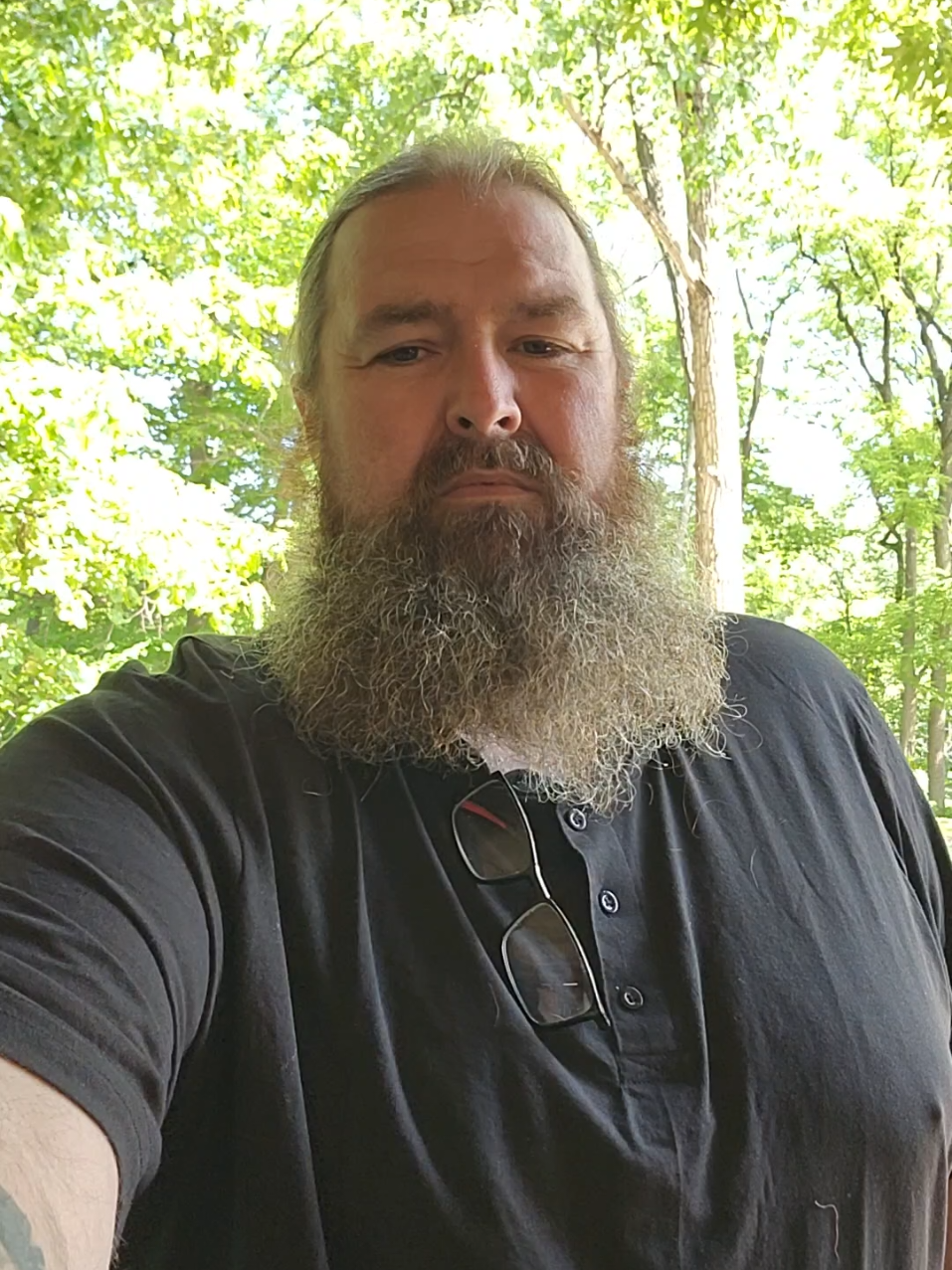 TikTok post by @d_rock1979 for Real Essentials. Caption reads: #bigandtall #shirts #mens @Real Essentials Apparel.