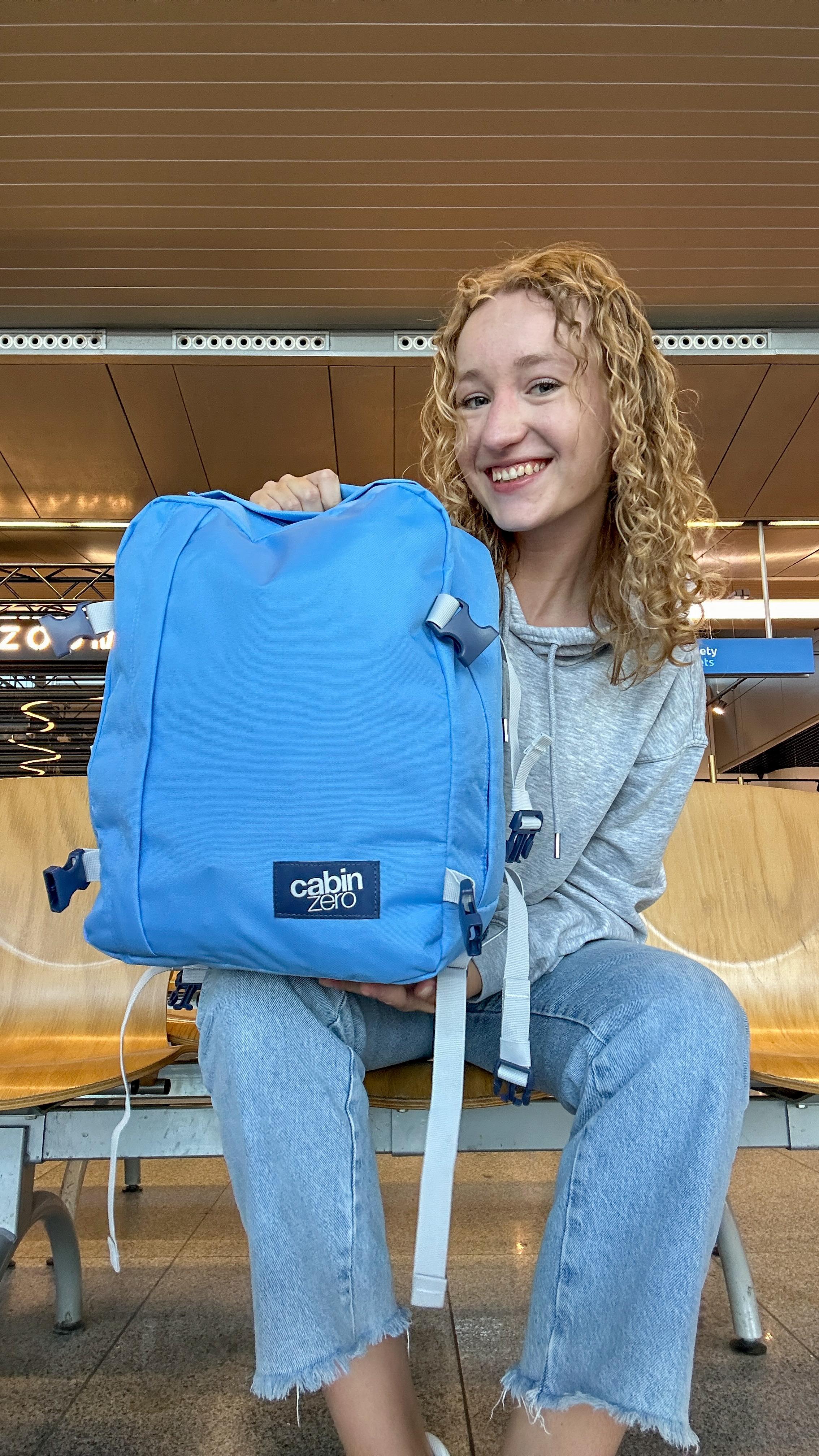 Instagram post by @jula.zawal for CABINZERO. Caption reads: [...] IMPORTANTLY… A backpack that keeps up!....