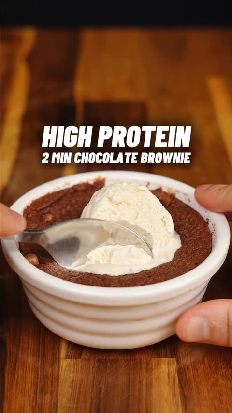 Instagram post by @panaceapalm for Protein Works. Caption reads: 2 Minute High Protein Chocolate Brownie!....