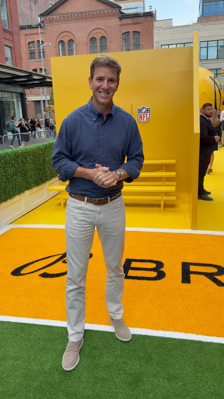 Instagram post by @thepeoplegallery_ for Breitling. Caption reads: @elimanning celebrating @breitling and @nfl....