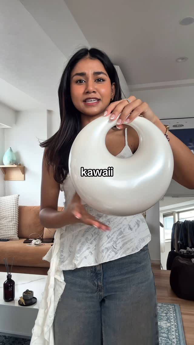 Instagram post by @hiananyaa_ for Buzzfeed. Caption reads: Only 500 of these World x Nik Bentel bags exist 🌏....