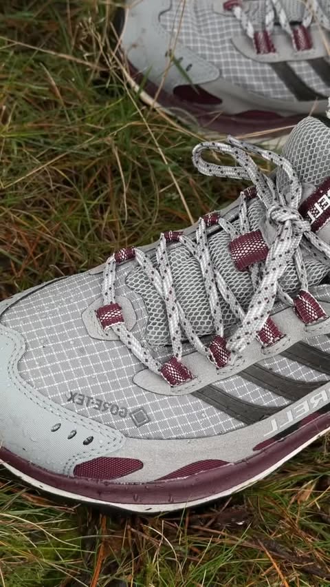 Instagram post by @lau.explores for Merrell. Caption reads: advertising for @merrelleu | rain or shine, wet....